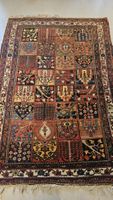 Ancien tapis persan à décor de jardin – probablement Bakhtia