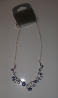 Collier fantaisie argenté et bleu, neuf avec étiquette.