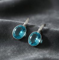 Elegante Silber 925 Ohrhänger mit facettierten blauen Topas