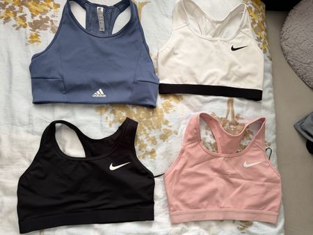 Sport BHs Nike M Adidas S 4 Stk. 