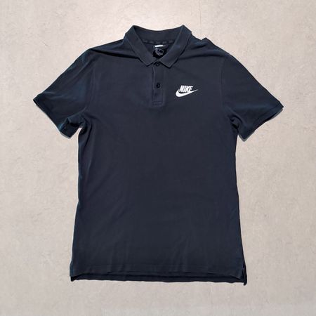 Nike Poloshirt schwarz – Grösse M – weisses Logo
