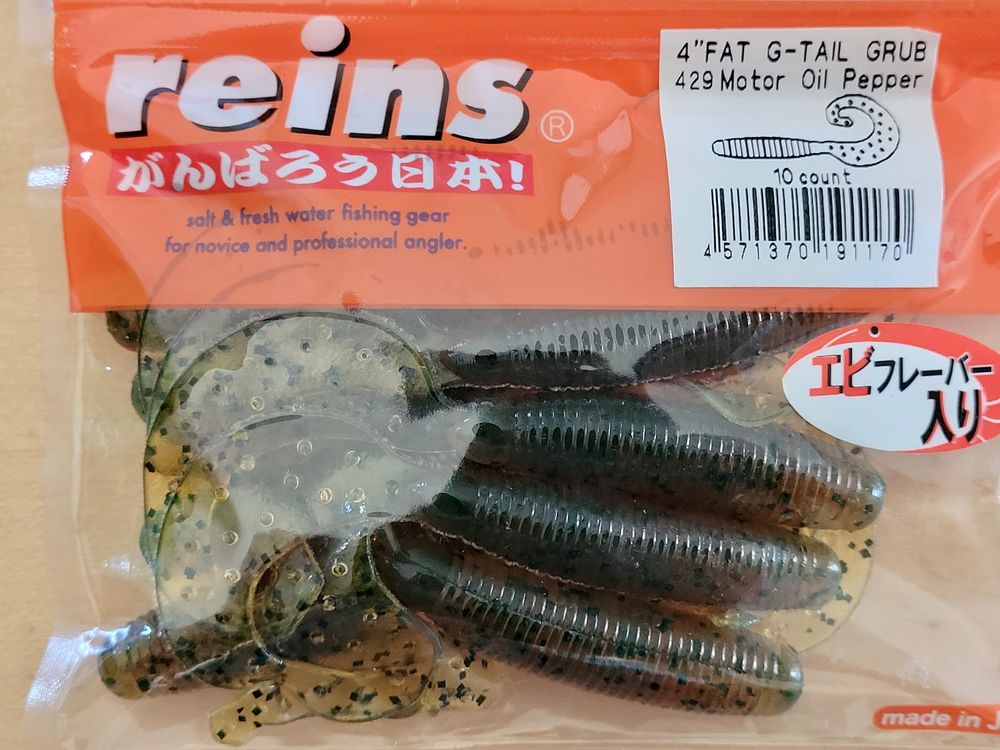 REINS FAT G-Tail Grub - MotorOil Pepper | Kaufen auf Ricardo