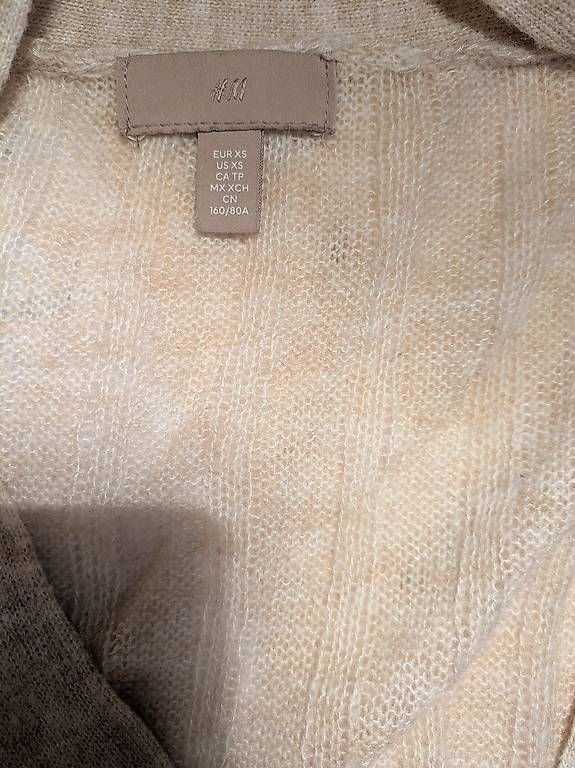 Giacche: Halbtransparente beige Strickjacke, Grösse XS – Usato da Schwyz venduto da Magdalena86 1