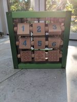 Holz-Motorikwürfel Spielcenter + Motorikschleife