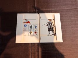 Briefmarken und Postkarten sett.