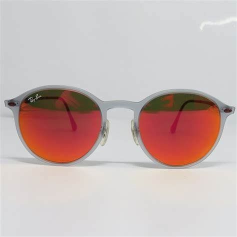Ray-Ban Occhiali & Lenti: Ray-Ban RB4224 Round LightRay 650/6Q – Nuovo (secondo la descrizione) da Dietlikon venduto da Bonamesa