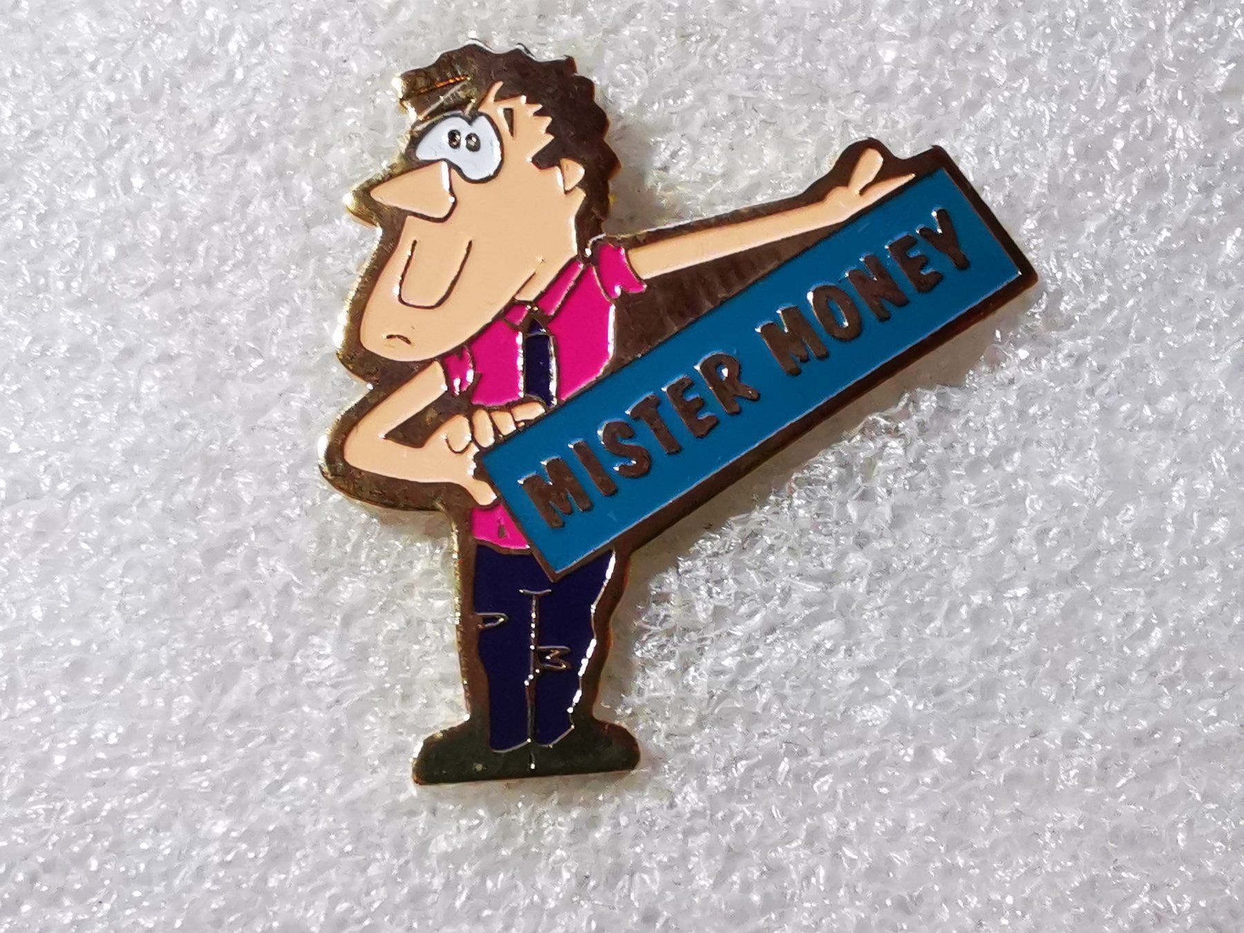 Plaketten & Abzeichen: Ansteckpin 110: Mister Money – Gebraucht aus Oppligen von Pin-Fall-Shop