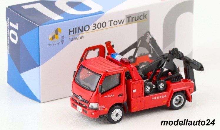 Modellini d'auto: Hino 300 Abschleppwagen  / Tiny 1:64 – Nuovo e nell'imballaggio originale da Seuzach venduto da Modellauto24