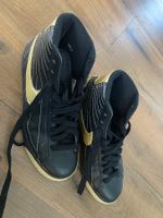 Nike Mid Cut Sneaker schwarz-gold