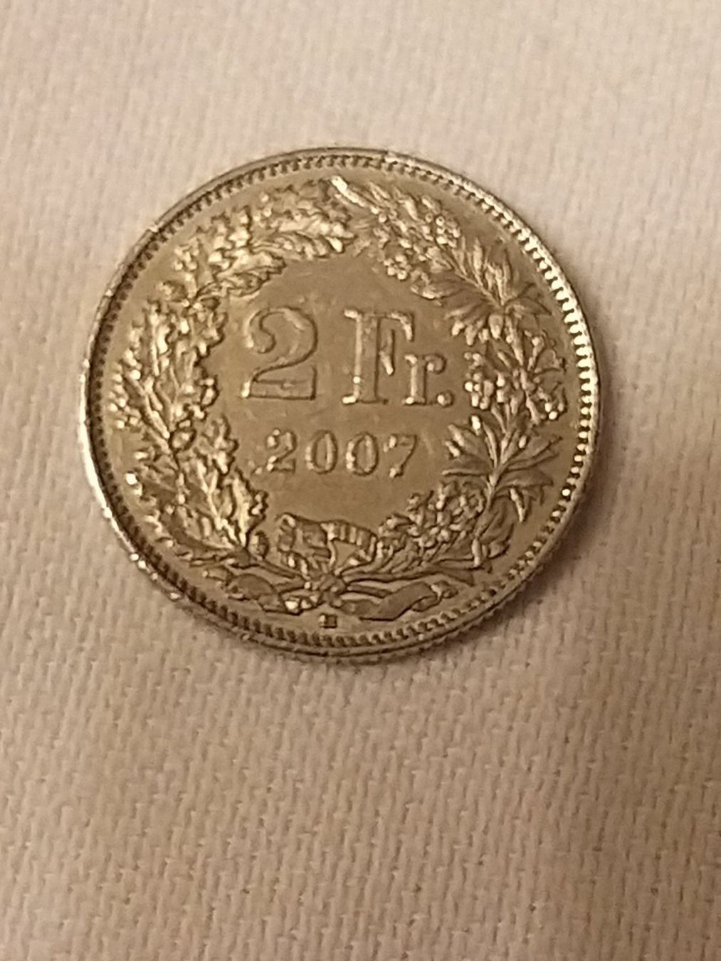 Tutti le monete: Pièce rare 2 francs suisses 2007 – Usato da La Chaux-de-Fonds venduto da Marteaux