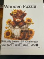 Wooden-Puzzle-Holzpuzzle-Highland-Kuh-Blume-Familie 14x14cm