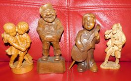 4 Holzfiguren, H 13 bis 17 cm