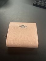 Portefeuille Coach rose