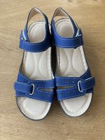 Neue Sandalen