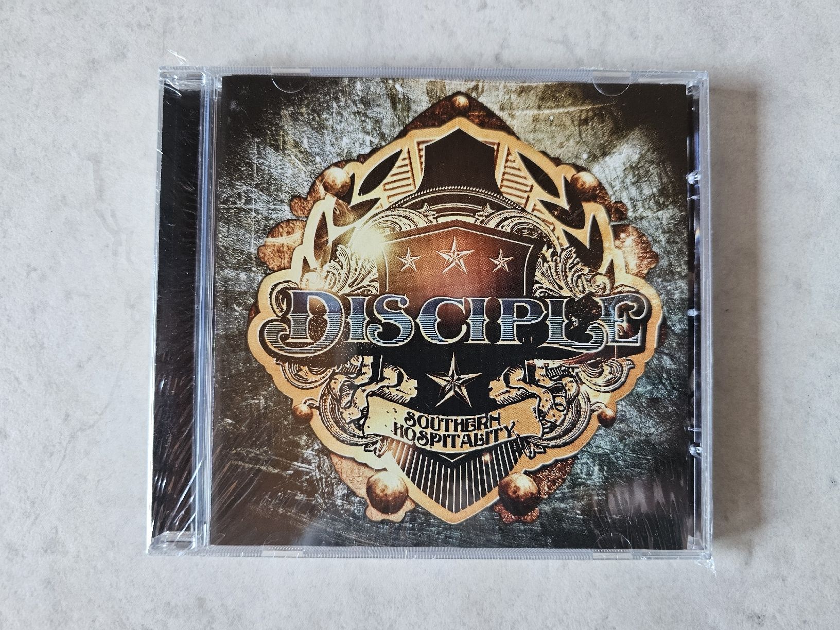 CD: Disciple  -  Southern Hospitality / Fabrikneu – Nuovo e nell'imballaggio originale da Schneisingen venduto da backstore24