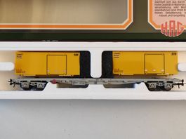 SBB Tragwagen Sgss mit Postcontainer von Hag H0, WS