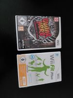 Wii Spiele Guitar Hero und Wii Fit Plus 