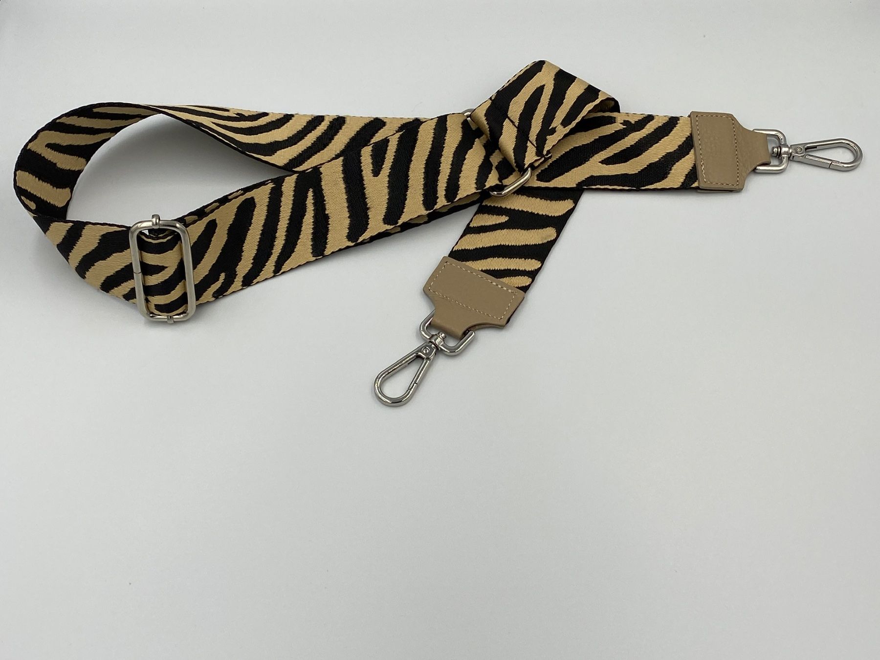 Altro in  Abbigliamento & Accessori: Schulterriemen "Zebra Taupe" – Nuovo e nell'imballaggio originale da Bülach venduto da DuffyFashionAvenue
