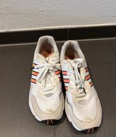 adidas Yung-96 sneakers in a white, orange, and grey colorwa
