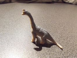Dinosaurier schwarz/beige, langer Hals/Sc