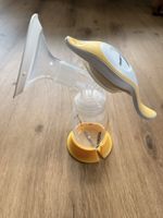Milchpumpe Medela Handpumpe gelb weiss NEU