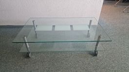 Couchtisch aus Glas mit Rollen gebraucht guter Zustand