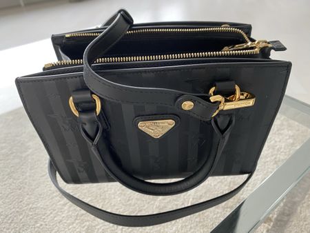 Maison Mollerus schwarze Tasche  mit Gold Plate