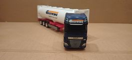 HERPA .DAF XF 4X2. PORTE CONTENAIR.TRANSPORT GREIWING. 1:87.