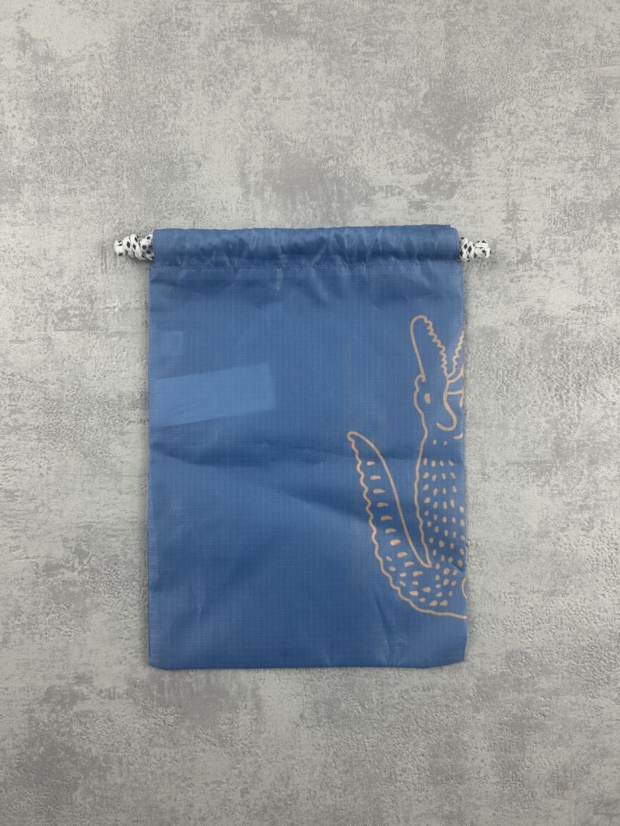 Lacoste Taschen: Pochette de maillot de bain Lacoste bleu – Neu (gemäss Beschreibung) aus Hauterive NE von Leo_o 1