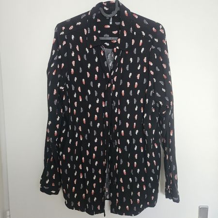 Bluse mit Federn