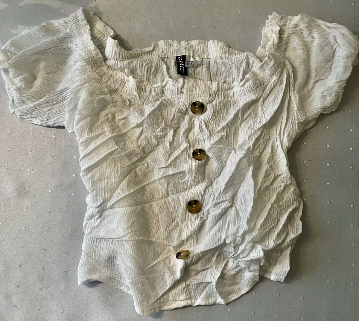 Top: Weisses luftiges Sommertop Gr. XS Divided – Usato da Schübelbach venduto da lan_2rdc 1