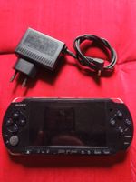 Sony PSP-3004 Slim & Lite + 9 Spiele & Zubehör