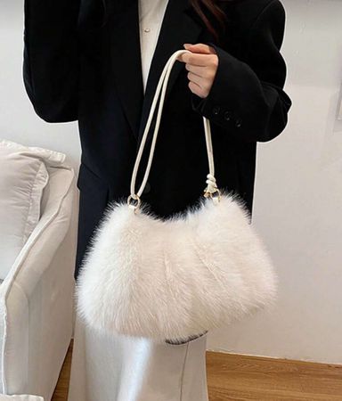 Sac à main en fourrure blanche
