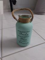 Mintfarbene Deko zb für Kerzenlicht mit Jute-Henkel.