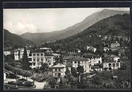 Tesserete /Lugano, Ortsansicht mit Bahn