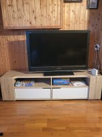 Meuble TV moderne avec tiroirs - idéal pour le salon!