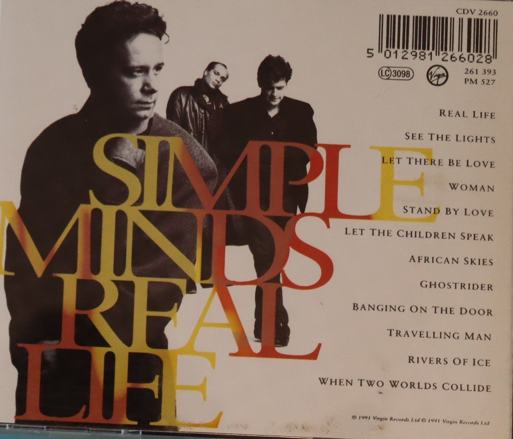 CDs: Simple Minds – Real Life – Gebraucht aus Luzern von CONTENTI 2