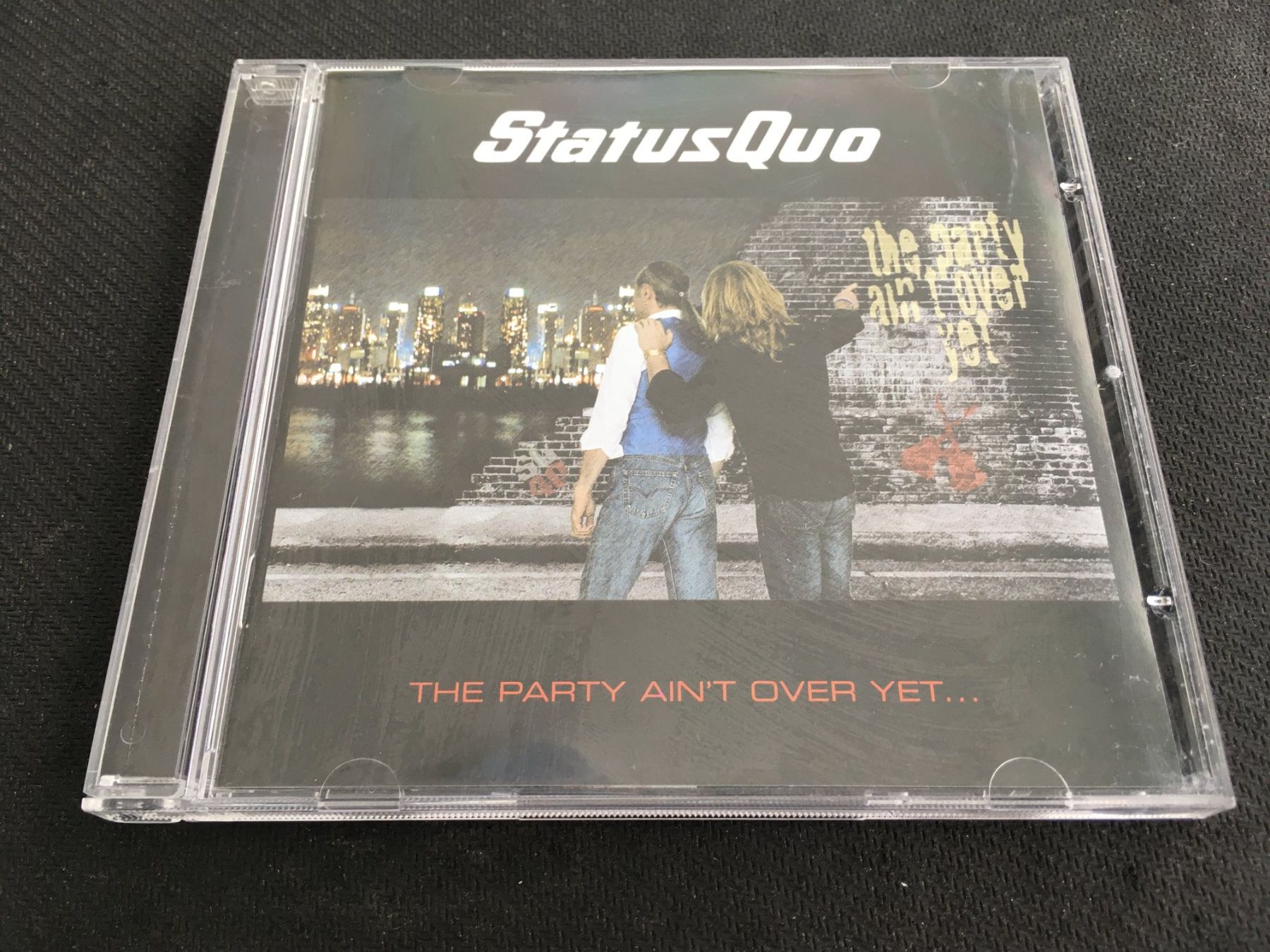 CDs: Status Quo - The party ain't over yet -CD- – Gebraucht aus St.Gallen von MedienJoe