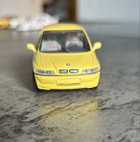 Voiture miniature BMW  E 1 jaune - 1/43