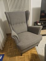 Ohrensessel mit Hocker