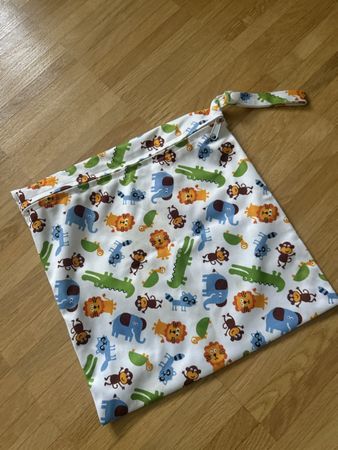 Praktische Nasstasche mit Tiermotiven, neuwertig!