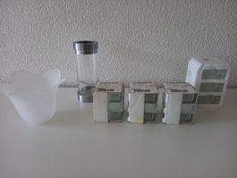 Verschiedene Teelichthalter aus Glas