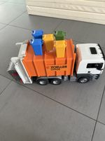 Camion poubelle Bruder MAN TGS Zoeller LOTOS + 5 poubelles –