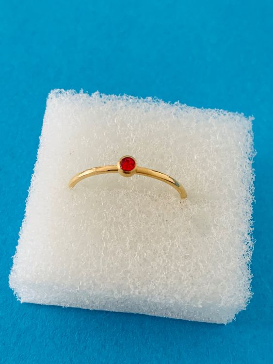 Fine Edelstahl Ring mit rote Stein. Vergoldet. Ab 1..Fr Kaufen auf Ricardo