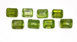 8x Péridots EM 9x7 mm - 21.11 ct - CERTIFICAT 760.- Fr