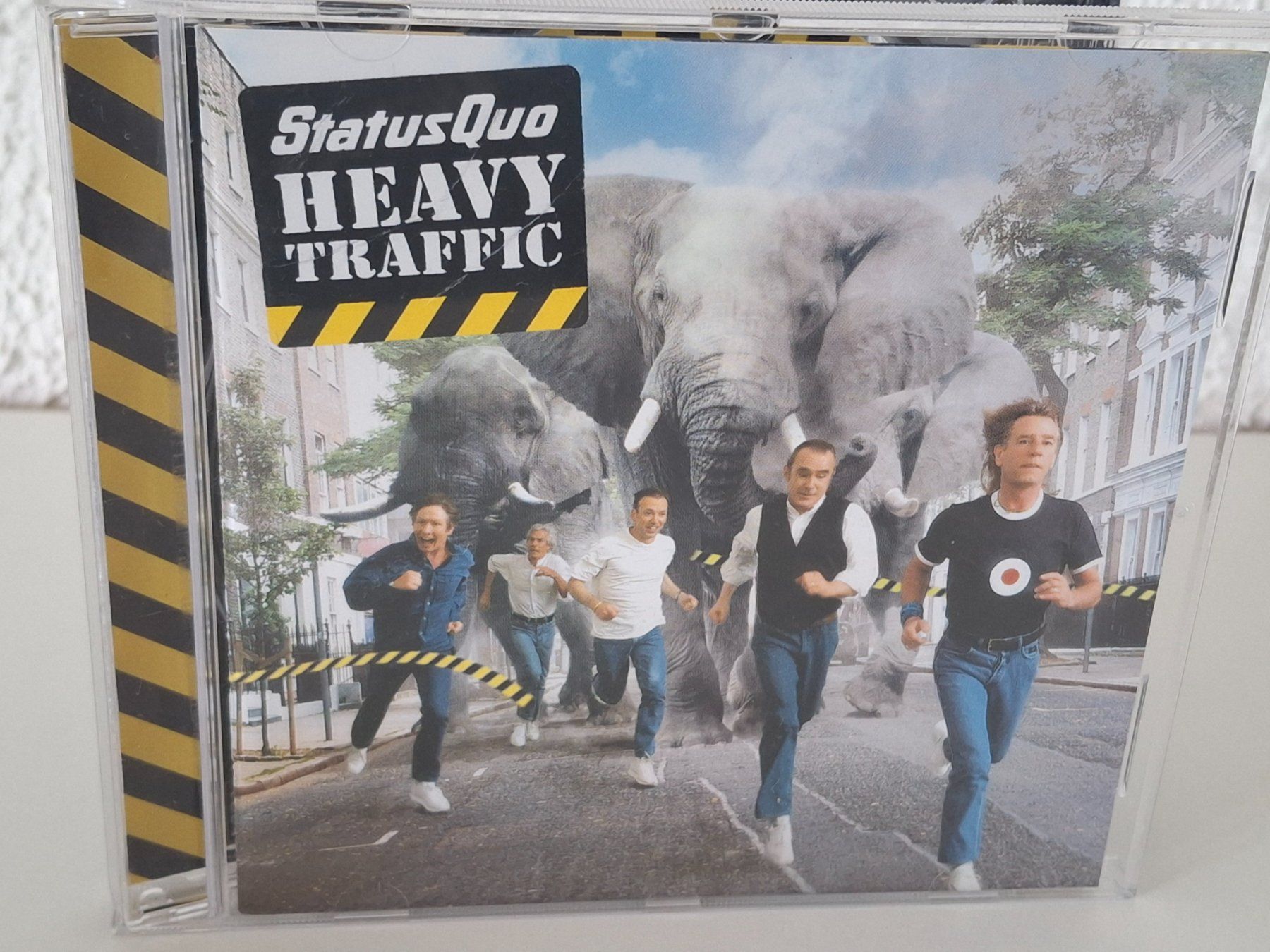 CDs: CD Status Quo - Heavy Traffic – D'occasion à Aarberg par Jackup1