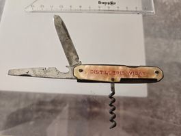 🤍 Antikes Werbemesser "Distillerie Wicky" – Cartailler