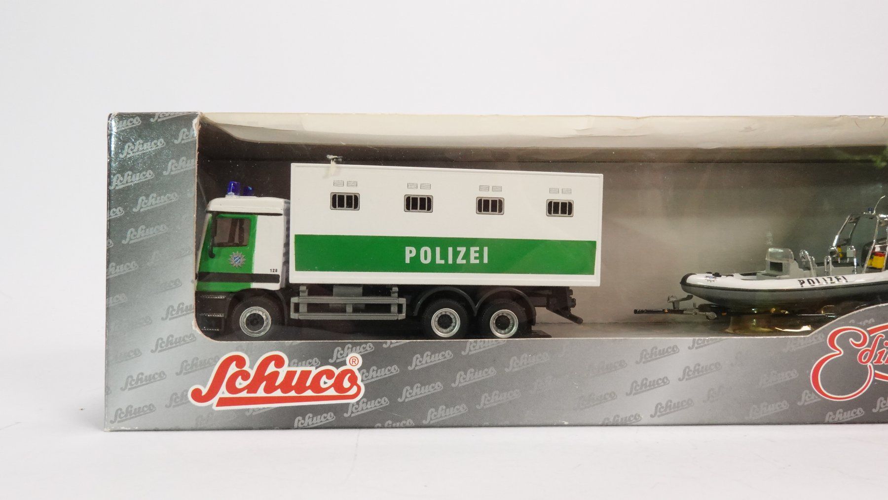 Schuco Modellini d'auto: c1 Schuco 21864 Polizei LKW mit Rettungsboot – Usato da Uetendorf venduto da tigermuegi 1
