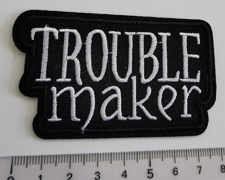 Patches: Troublemaker  - Aufnäher (neu) – Neu und originalverpackt aus Wilen b. Wollerau von morethanmusic