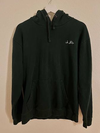 Dunkelgrüner Hoodie mit Aufdruck, Grösse M, frisch gewasc...